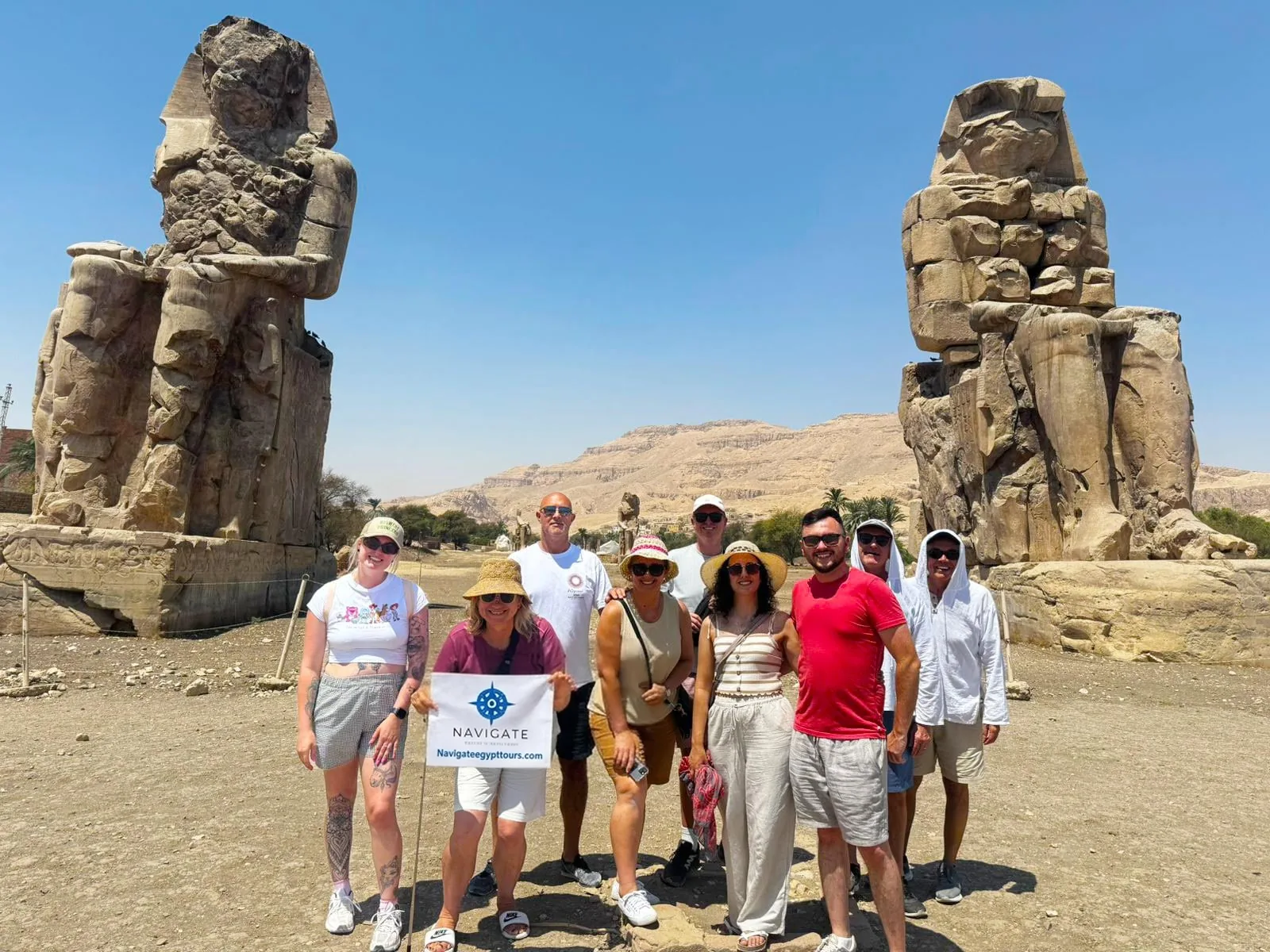 Travelers at the colossi of memnon