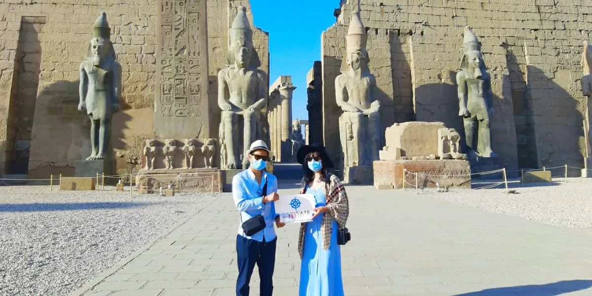 Travelers at luxor temple