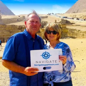 Travelers at giza pyramids complex