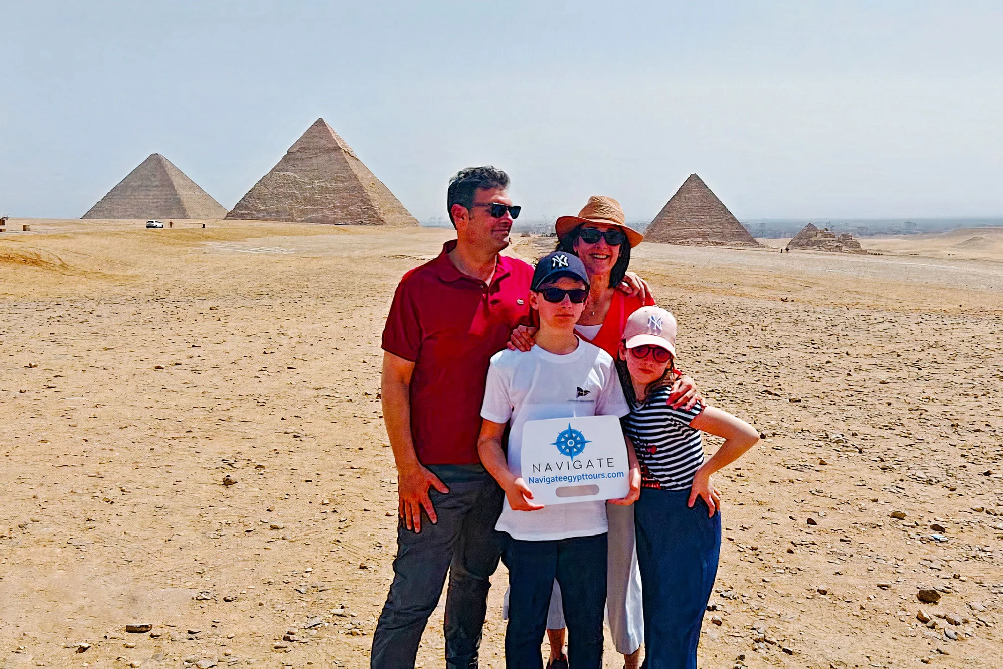 Family travelers at giza pyramids