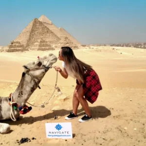 Travelers at giza pyramids complex